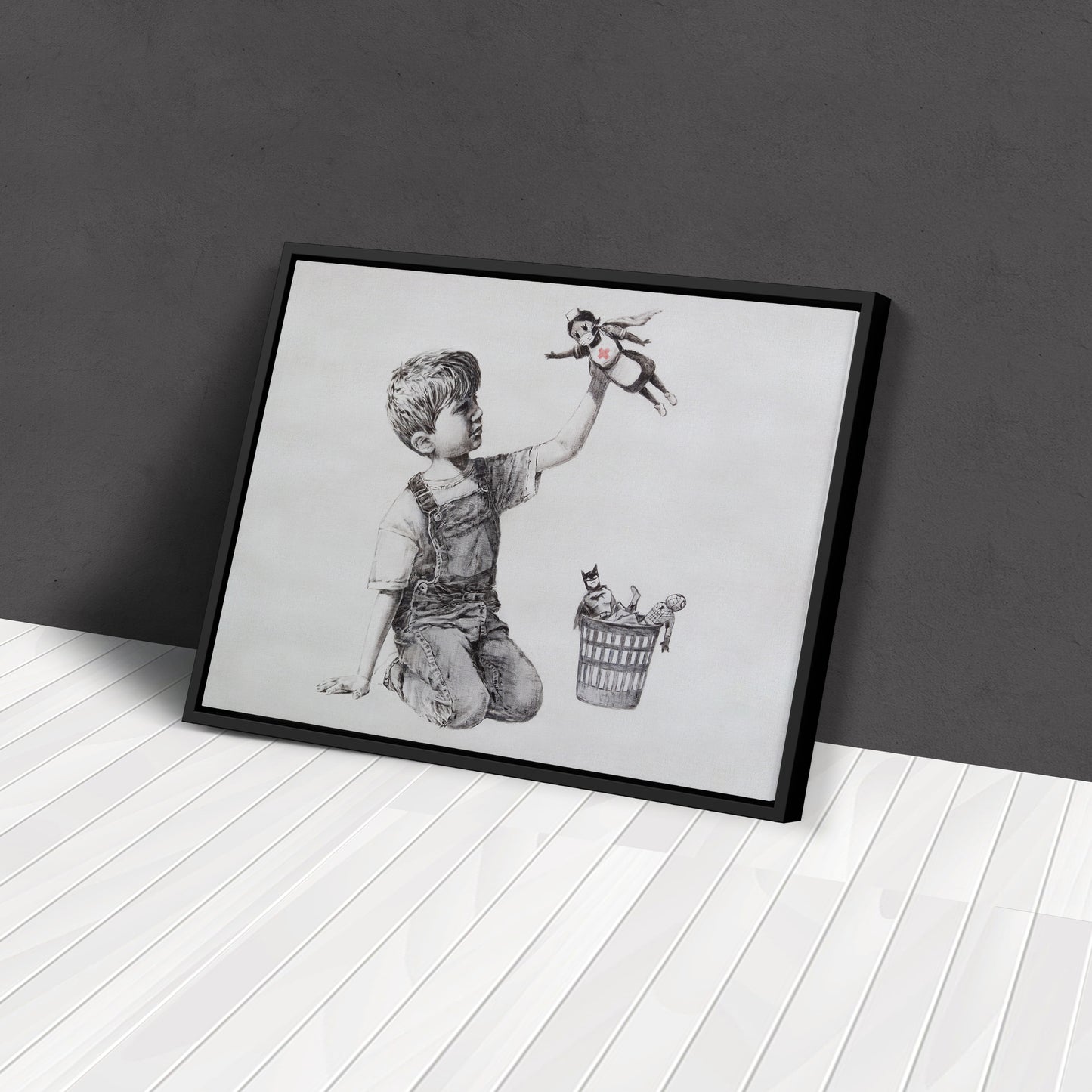Banksy 'Boy with Superhero Doll' Canvas Print - Framed Wall Art