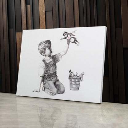 Banksy 'Boy with Superhero Doll' Canvas Print - Framed Wall Art